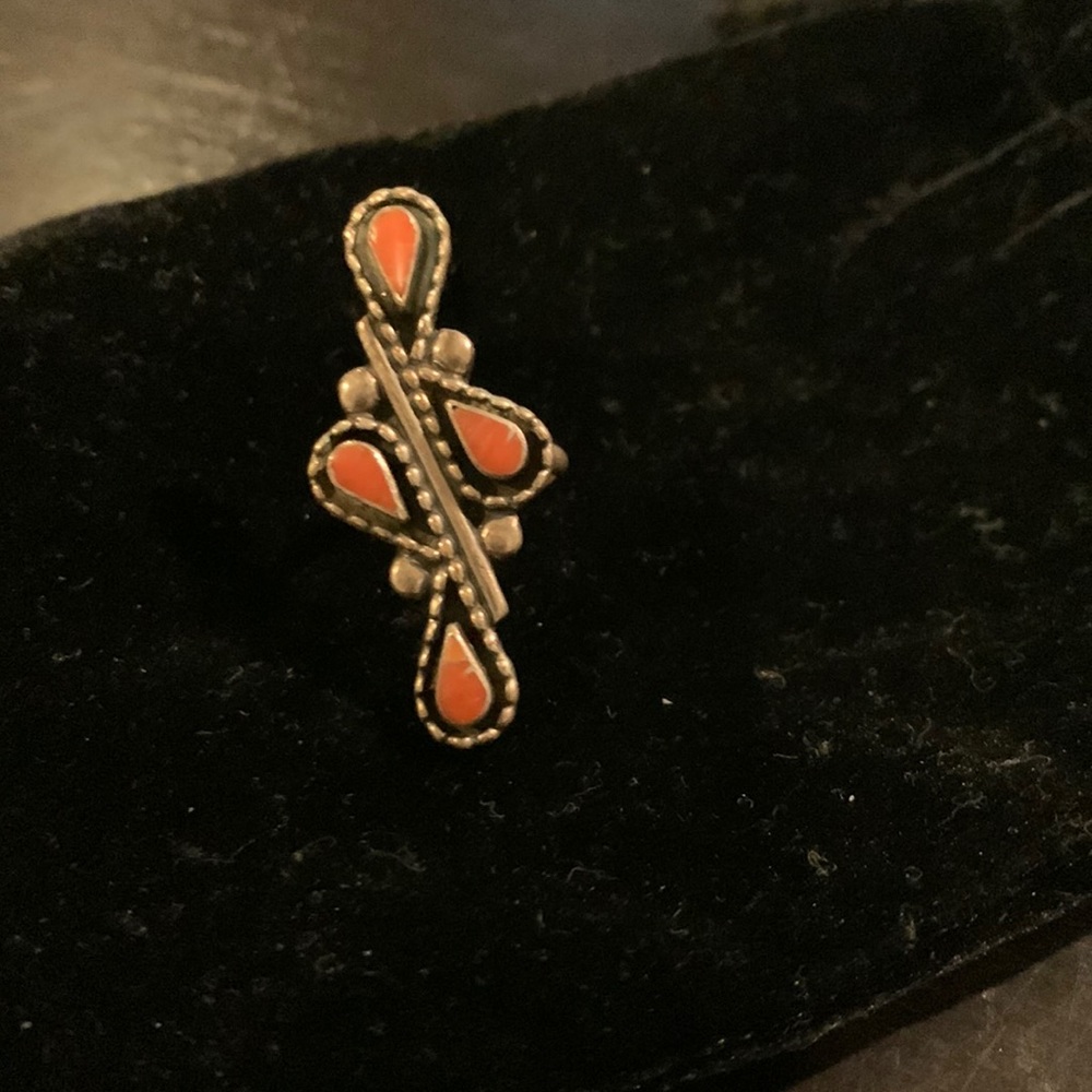 Silver ring with coral color stone